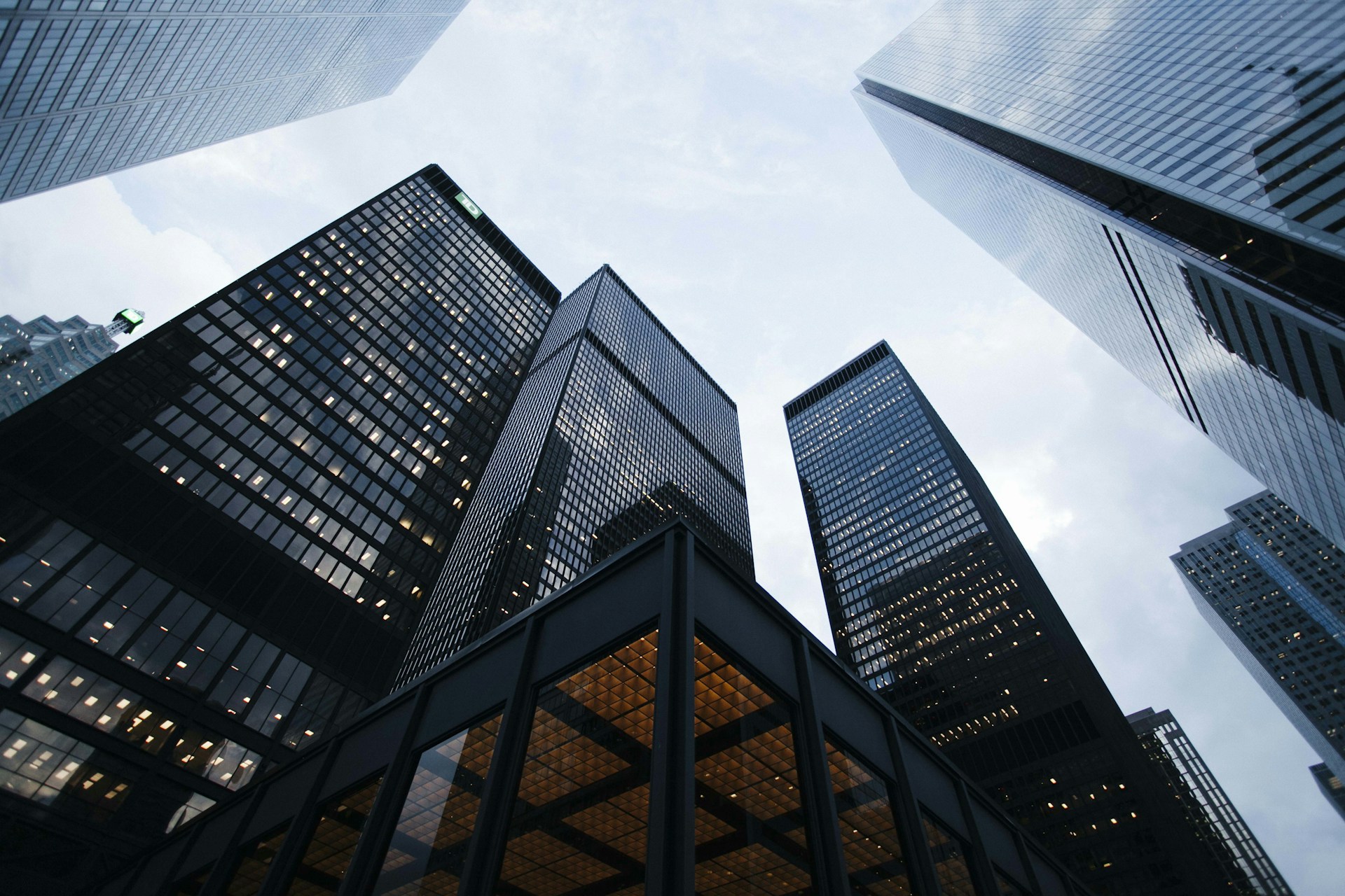 Architectural reference: modern glass and steel buildings seen from below